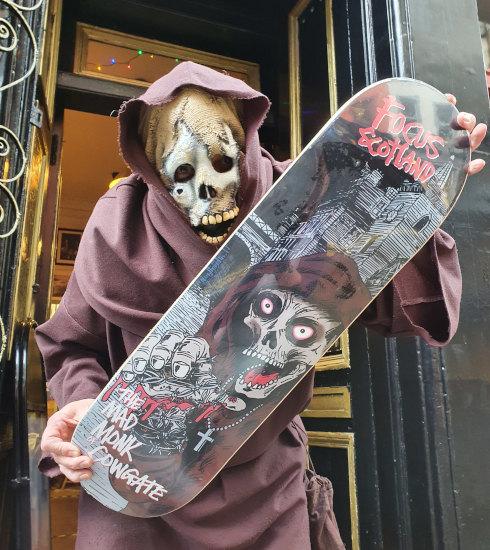 The Mad Monk of the Cowgate with his very own skateboard